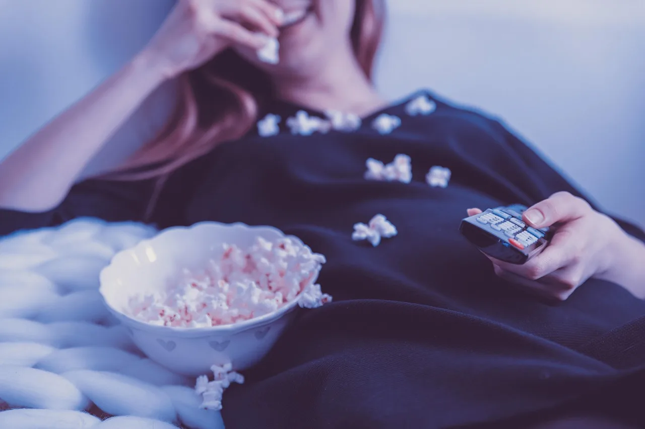 people, woman, tv, movies, television, female, happy, young, lifestyle, home, sofa, girl, watching, person, remote, night, funny, fun, food, popcorn, movies, movies, movies, television, television, television, television, television, sofa, popcorn, popcorn, popcorn. Is the room actually as familiar with easy movie and TV trivia picks as you think?