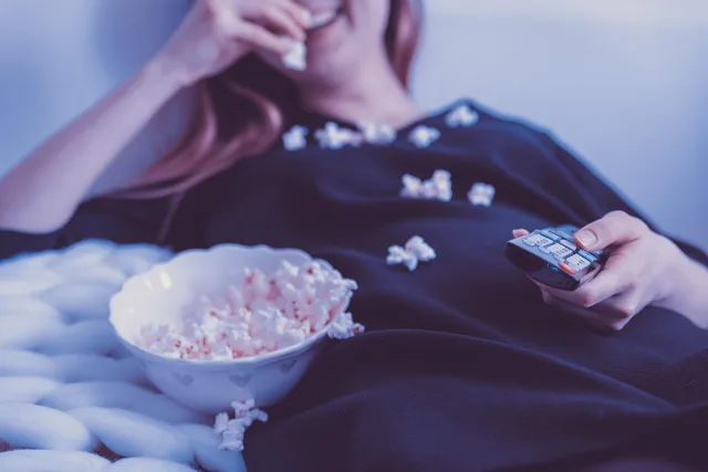 people, woman, tv, movies, television, female, happy, young, lifestyle, home, sofa, girl, watching, person, remote, night, funny, fun, food, popcorn, movies, movies, movies, television, television, television, television, television, sofa, popcorn, popcorn, popcorn. Is the room actually as familiar with easy movie and TV trivia picks as you think?