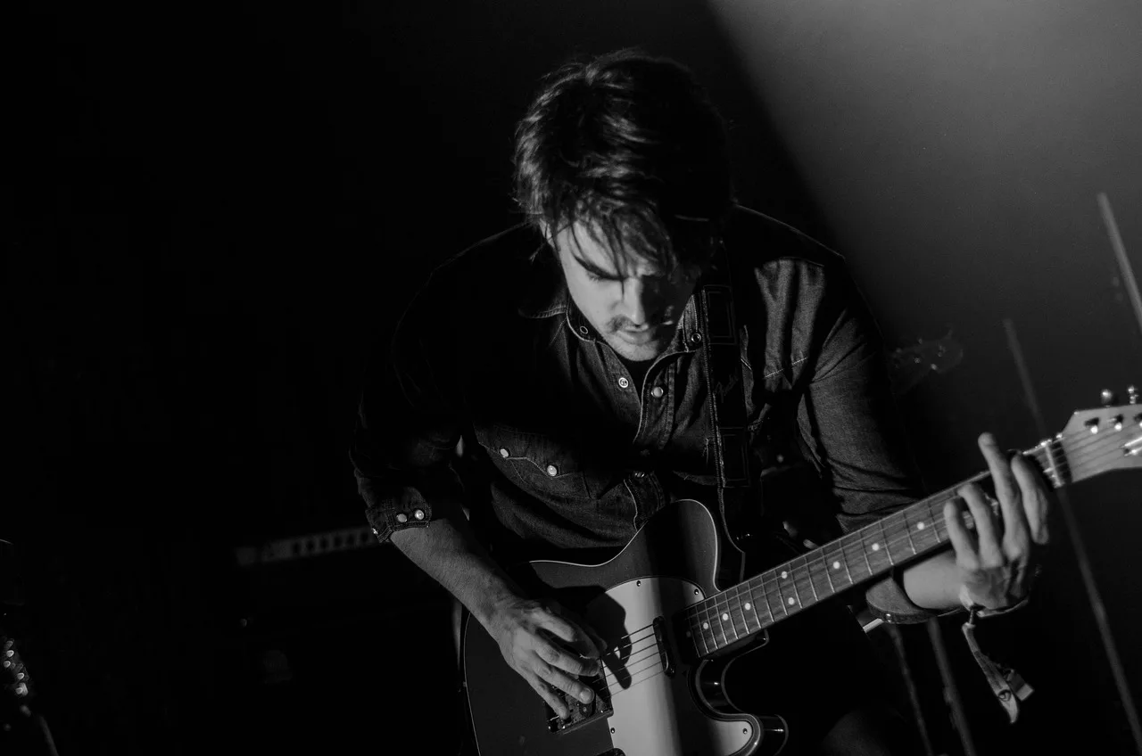 guitar, guitarist, man, music, musical instrument, musician, performance, person, string instrument, black and white, monochrome, guitar, guitar, guitar, guitar, guitar, guitarist, guitarist, music, music, musician, musician. How to Build Hard Music Celebrity Trivia Chains